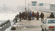 Washington, DC. 1-14-1982 On January 13, 1982, Air Florida Flight 90 crashed into Washington, DC's 14th Street Bridge and fell into the Potomac River shortly after taking off. A total of 70 passengers, 4 crew and 4 motorists on the bridge were killed. The crash of the Boeing 737-200 was due to an anti-icing system being left off. DC Police search the area on the 14th Street bridge for evidence where Air Florida Flight 90 hit before plunging into the frozen Potomac River the day before. Credit: (Photo by Mark Reinstein/Corbis via Getty Images)