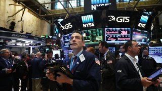 Traders work on the floor of the New York Stock Exchange following news that the United Kingdom has voted to leave the European Union on June 24, 2016 in New York City.