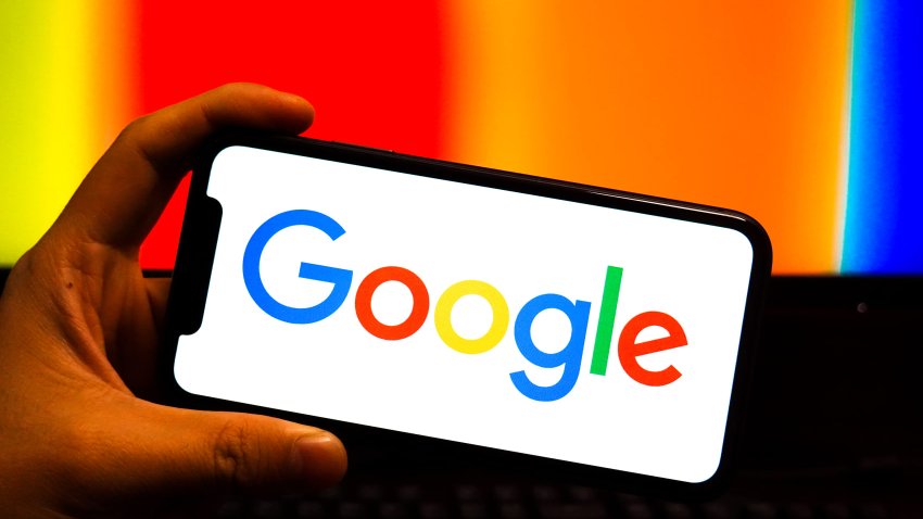 In this photo illustration, a Google logo is displayed on the screen of a smartphone. 