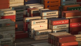 Shipping containers sit stacked at Kwai Tsing Container Terminal on October 16, 2024 in Hong Kong, China. 
