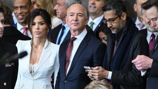 (L-R) Lauren Sanchez, Amazon founder Jeff Bezos, Google CEO Sundar Pichai and Tesla and SpaceX CEO Elon Musk attend the inauguration ceremony before Donald Trump is sworn in as the 47th US President in the US Capitol Rotunda in Washington, DC, on January 20, 2025.