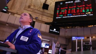 Traders work on the floor of the New York Stock Exchange during morning trading on February 03, 2025 in New York City. 