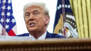 U.S. President Donald Trump sits in the Oval Office of the White House in Washington on Feb. 13, 2025.