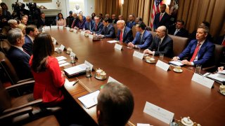 U.S. President Donald Trump hosts his first cabinet meeting with Elon Musk in attendance, Washington, D.C.,  U.S., February 26, 2025. 