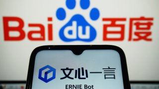 ZHEJIANG, CHINA – MARCH 16 2023: A view of the logo of ERNIE Bot, an AI chatbot service developed by Chinese search engine Baidu, March 16, 2023.