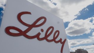 A sign with the company logo sits outside of the headquarters of Eli Lilly in Indianapolis, Indiana, on March 17, 2024.