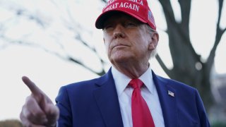 U.S. President Donald Trump speaks with members of the media on the South Lawn before boarding Marine One at the White House, in Washington, D.C., U.S., Feb. 28, 2025. 
