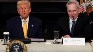 U.S. President Donald Trump sits next to Crypto czar David Sacks at the White House Crypto Summit at the White House in Washington, D.C., U.S.,  March 7, 2025.