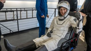 NASA astronaut Suni Williams is helped out of a SpaceX Dragon spacecraft onboard the SpaceX recovery ship MEGAN after she, NASA astronaut Nick Hague, and Butch Wilmore, and Roscosmos cosmonaut Aleksandr Gorbunov landed in the water off the coast of Tallahassee, Florida, Tuesday, March 18, 2025. 