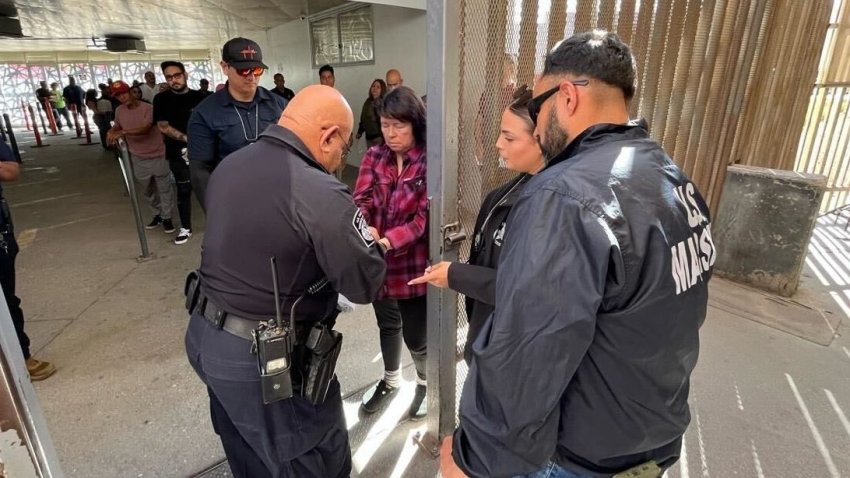 Yolonda Marodi is shown being brought into the U.S. to be taken into custody on accusations she killed her wife, Cal Fire Capt. Rebecca “Becky” Marodi.
