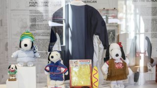 Figurines representing Snoopy wear creations as part of Peanuts’ 75th Anniversary, at the Snoopy In Style exhibition that runs from March 22 through April 5, in Paris Thursday, March 20, 2025.