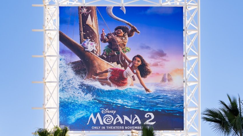 A view of a "Moana 2" billboard above the El Capitan Entertainment Centre