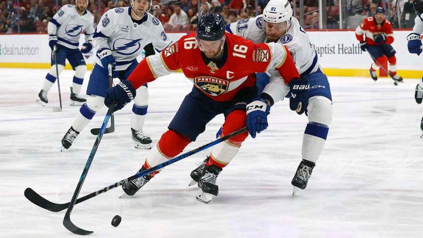 SUNRISE, FLORIDA -MARCH 3: Aleksander Barkov #16 of the Florida Panthers battles for possession against Erik Cernak #81 of the Tampa Bay Lightning at the Amerant Bank Arena on March 3, 2025 in Sunrise, Florida. (Photo by Eliot J. Schechter/NHLI via Getty Images)