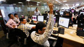 India traders at the Motilal Oswal Financial Services Ltd. office in Mumbai, India.