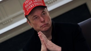 Tesla CEO Elon Musk wears a ‘Trump Was Right About Everything!’ hat while attending a cabinet meeting at the White House, in Washington, D.C., U.S., March 24, 2025.