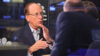 Larry Fink, CEO of BlackRock, speaks with David Faber and Jim Cramer on “Squawk on the Street” at the New York Stock Exchange during morning trading on April 11, 2025 in New York City.