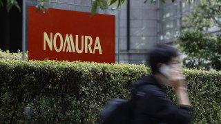 Signage for Nomura Holdings Inc. outside the company’s Otemachi head office in Tokyo, Japan, on Wednesday, Oct. 30, 2024.