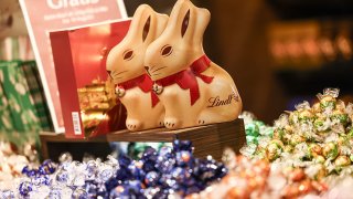 BASEL, SWITZERLAND – APRIL 11: Lindt Chocolate Easter bunnies are seen in a store display on April 11, 2025 in Basel, Switzerland.