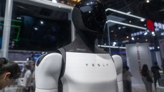 An Optimus bot from Tesla on display during the 2024 World AI Conference & High-Level Meeting on Global AI Governance at the Shanghai World Expo Exhibition and Convention Center on July 7, 2024.