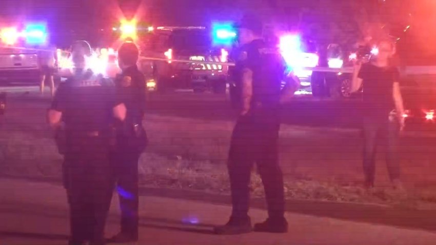 Police gathered by vehicles