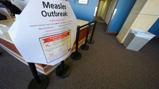 FILE - A measles sign is seen at the Texas Tech University Health Sciences Center, Feb. 25, 2025, in Lubbock, Texas.