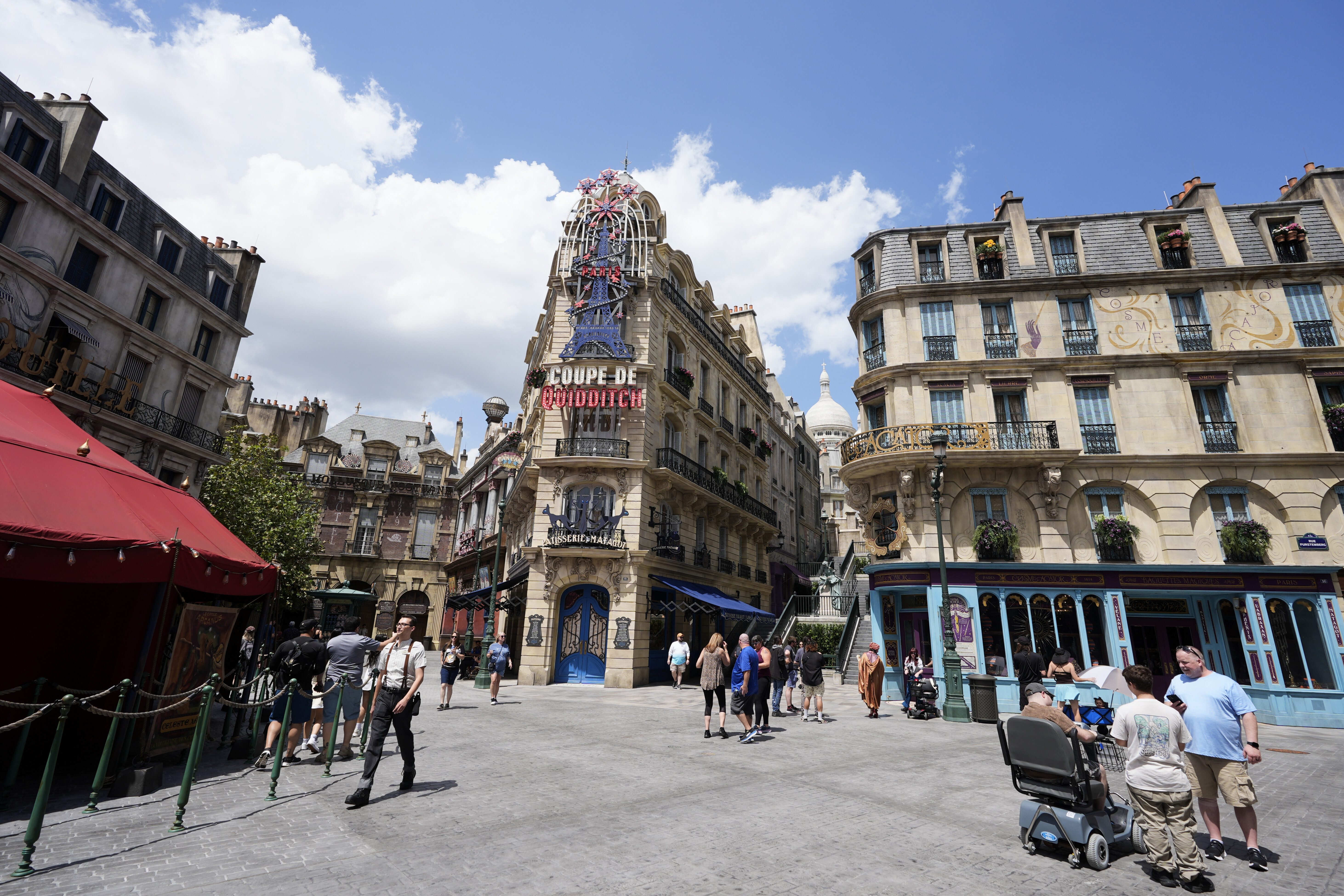 Guests stroll through the streets of The Wizarding World of Harry Potter – Ministry of Magic