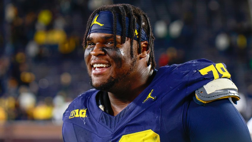 ANN ARBOR, MI – NOVEMBER 2: Kenneth Grant #78 of Michigan smiles after a game between University of Oregon and University of Michigan at Michigan Stadium on November 2, 2024 in Ann Arbor, Michigan. (Photo by Michael Miller/ISI Photos/Getty Images)