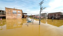 In an aerial view, water covers roadways