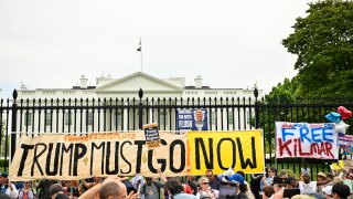 Demostrators rally near the White House during the nationwide "Hands Off!" protest