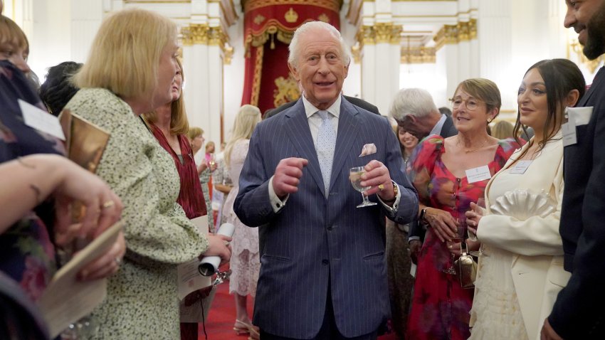 LONDON, ENGLAND – APRIL 30: King Charles III speaks to guests during a reception in celebration of community-based initiatives raising awareness about cancer and supporting those living with cancer at Buckingham Palace on April 30, 2025 in London, England.