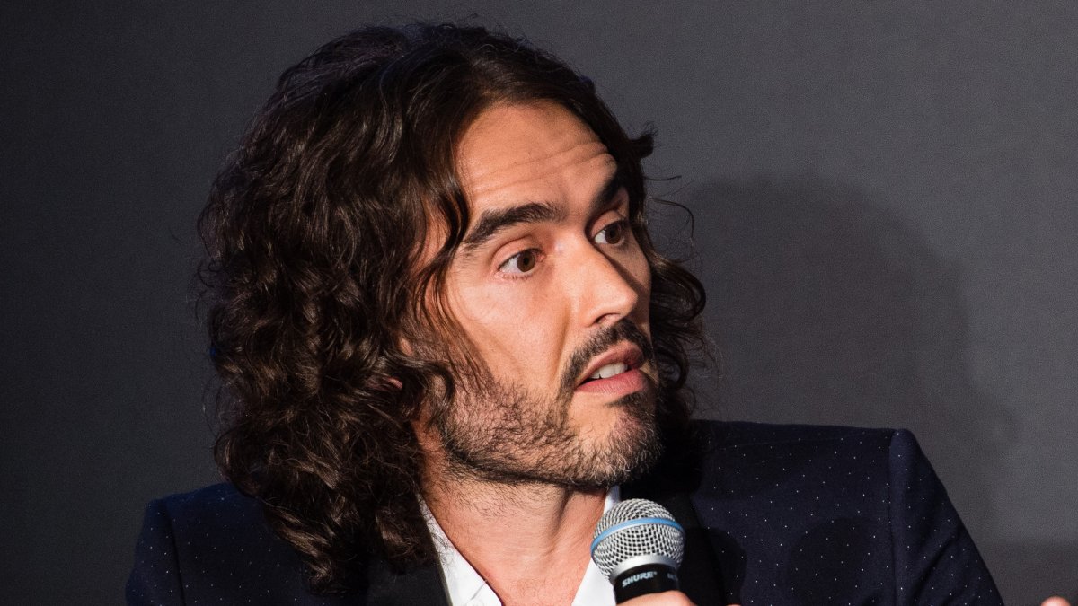 Comedian Russell Brand charged by UK police with rape and sexual assault Comedian Russell Brand charged by UK police with rape and sexual assault
