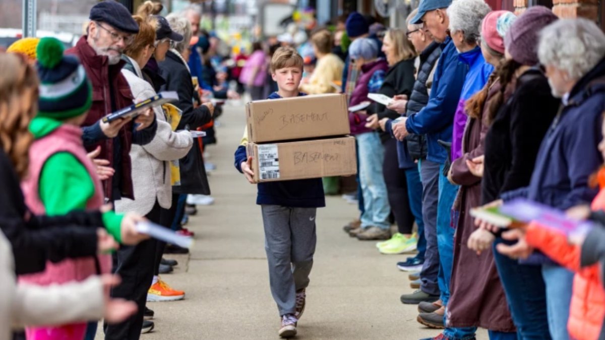 'Book by book': Michigan community takes novel approach moving local bookstore 
