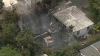 Woman emotional as fire devastates NW Miami-Dade home of 40 years
