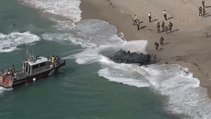 Crews responded after a large fire consumed a boat at Fort Lauderdale beach on Wednesday morning.