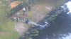 Crews respond after car crashes into canal in Pompano Beach