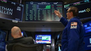 Traders work on the floor of the New York Stock Exchange during afternoon trading on April 9, 2025 in New York.