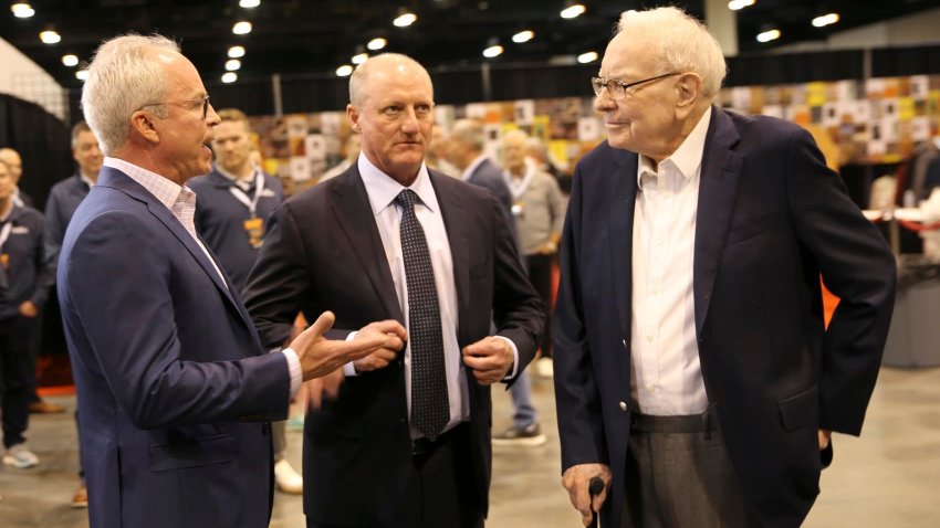 Warren Buffett and Greg Abel walkthrough the Berkshire Hathaway Annual Shareholders Meeting in Omaha, Nebraska on May 3, 2025.