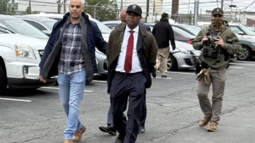 Mayor Ras Baraka of Newark in handcuffs outside Delaney Hall detention facility in Newark, NJ on May 9, 2025.