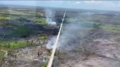 Crews still working to contain brush fire in southwest Miami-Dade