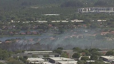 Crews battle large fire near residential area in SW Miami-Dade