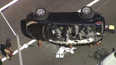 RAW: Video shows car overturned, police response after crash in Miami Beach
