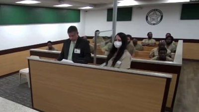 Uber driver who pointed gun at passenger given bond