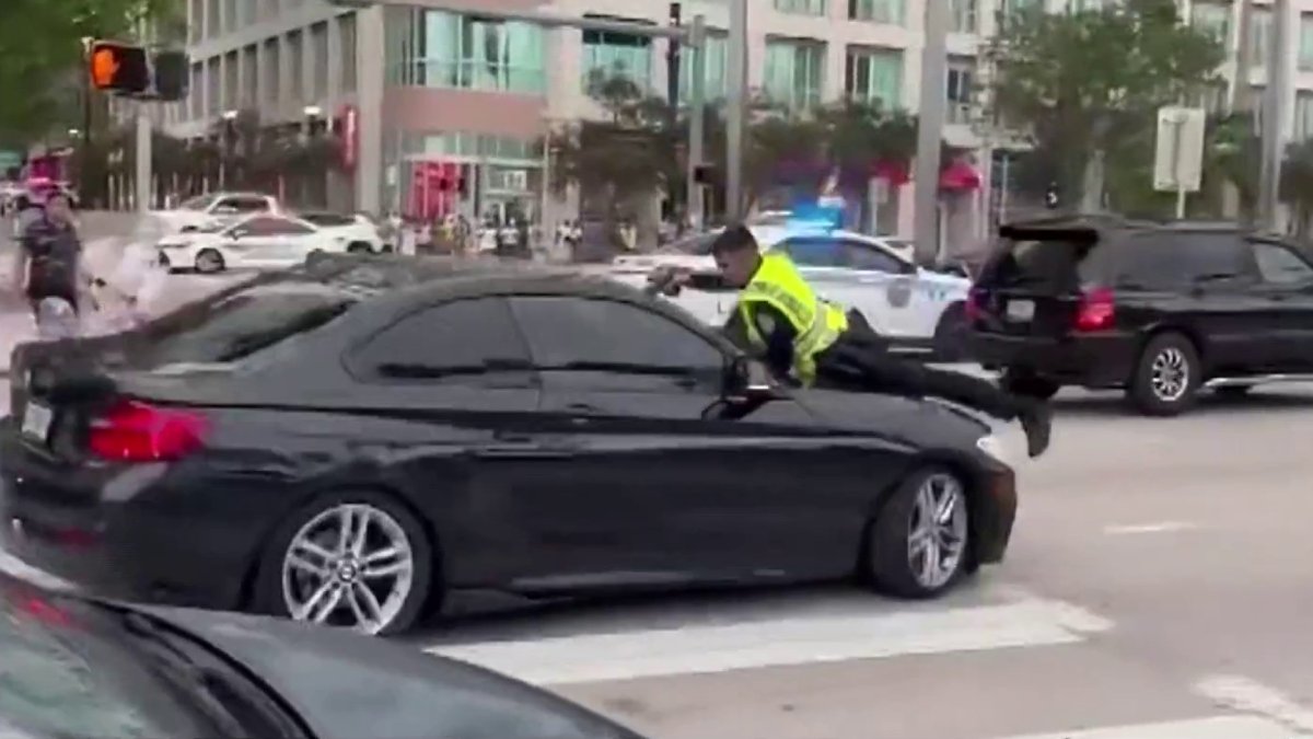 Video shows Miami Police officer shooting driver while on hood of moving car – NBC 6 South Florida