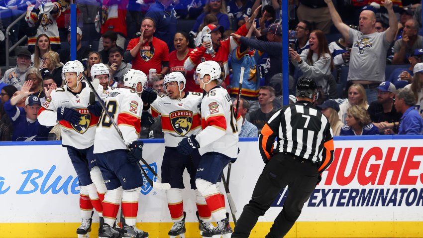 TAMPA, FLORIDA – APRIL 30: Eetu Luostarinen #27 of the Florida Panthers celebrates with teammates after scoring a goal against the Tampa Bay Lightning during the third period in Game Five of the First Round of the 2025 Stanley Cup Playoffs at Amalie Arena on April 30, 2025 in Tampa, Florida.  (Photo by Mike Carlson/Getty Images)