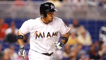 MIAMI, FL - JUNE 20: Rafael Furcal #15 of the Miami Marlins runs to first base during the third inning of the game against the New York Mets at Marlins Park on June 20, 2014 in Miami, Florida. (Photo by Rob Foldy/Getty Images)