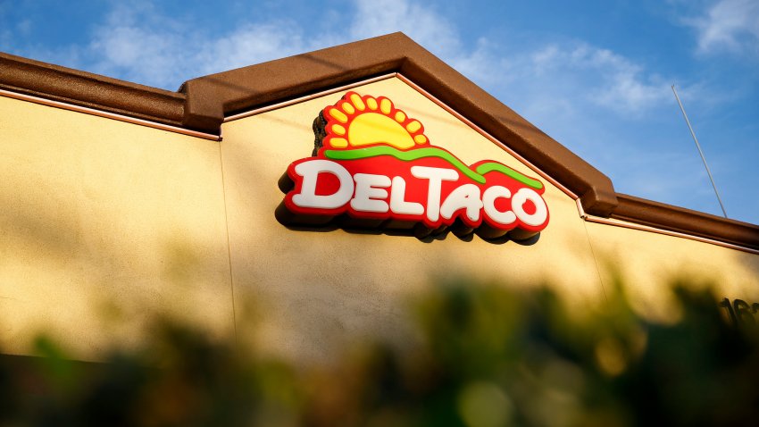 Del Taco signage is displayed outside of a Del Taco restaurant in Gardena, California, U.S., on Saturday, March 14, 2015. Del Taco, the Mexican chain known for pairing tacos with french fries, will become a publicly traded company in an acquisition by restaurateur Larry Levy that values the business at $500 million. Photographer: Patrick T. Fallon/Bloomberg via Getty Images