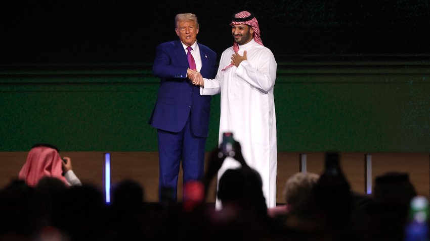 President Donald Trump greets Saudi Crown Prince Mohammed bin Salman during the Saudi-US investment forum at the King Abdul Aziz International Conference Center in Riyadh on May 13, 2025.