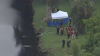 Police investigating after man's body found floating in Plantation canal