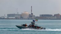 An Islamic Revolutionary Guard Corps speed boat sailing along the Persian Gulf during the IRGC marine parade to commemorate Persian Gulf National Day, near the Bushehr nuclear power plant in the seaport city of Bushehr, in the south of Iran, on April 29, 2024.
