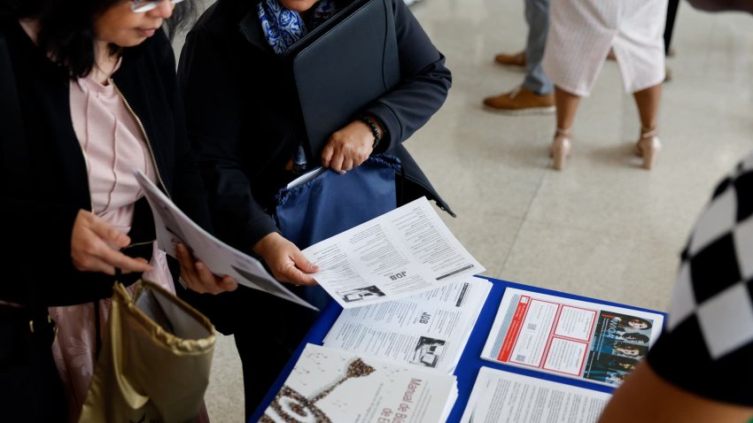 Job seekers at a job fair hosted by the Metropolitan Washington Airports Authority to support federal workers looking for new career opportunities, at Ronald Reagan Washington National Airport in Arlington, Virginia, on April 25, 2025.